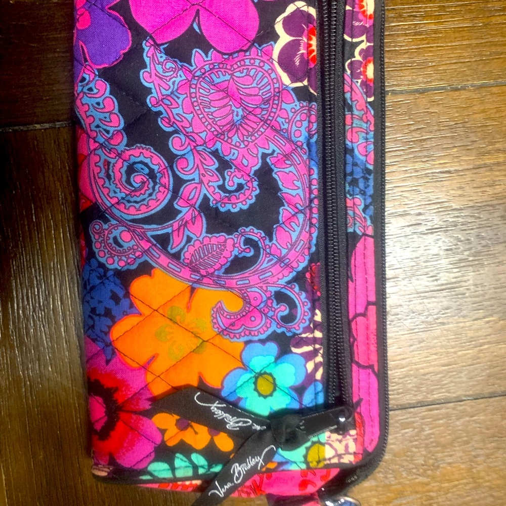 Vera Bradley wallet zipper on back and small wrist strap